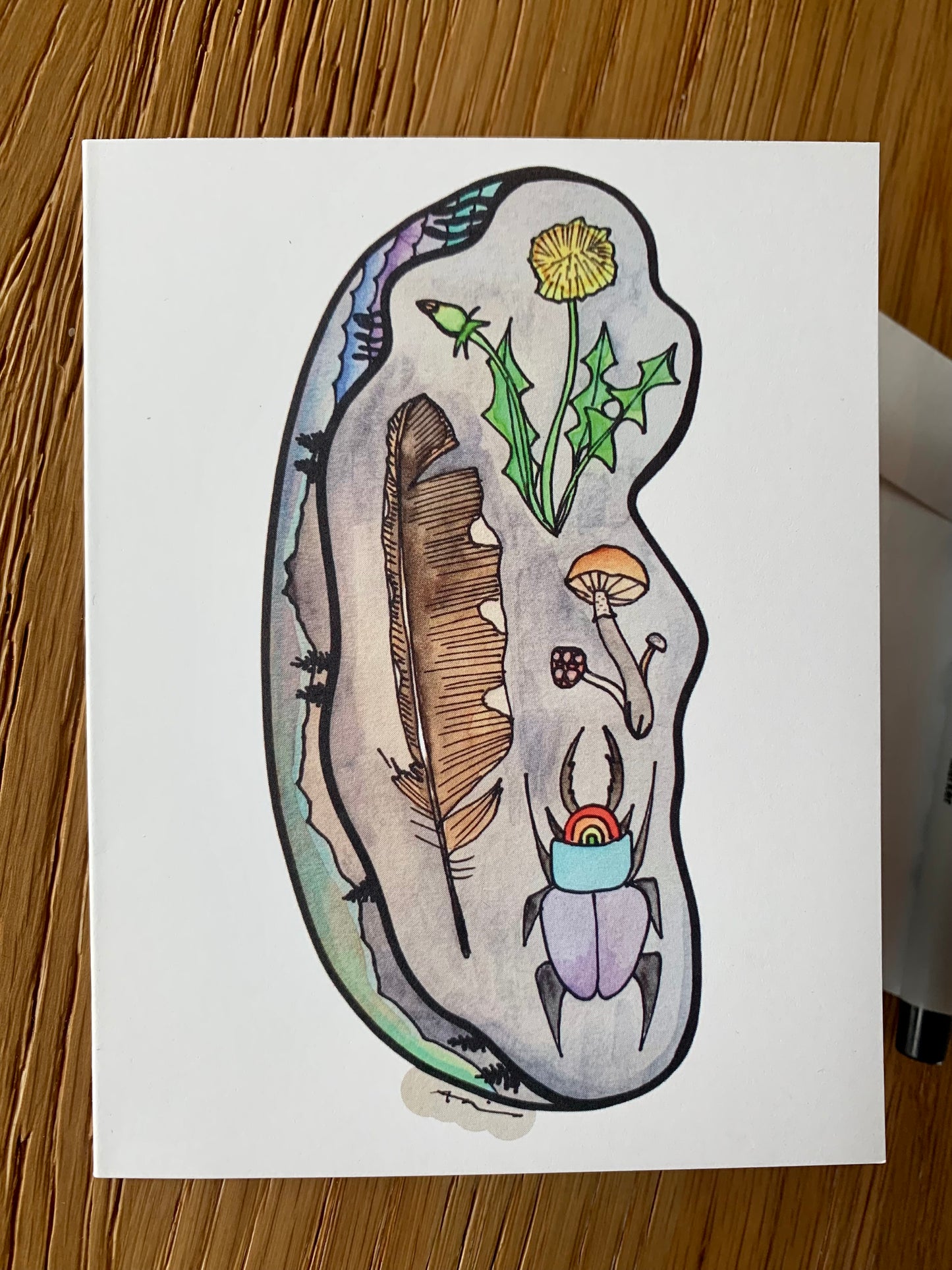 Feather layered worlds greeting card